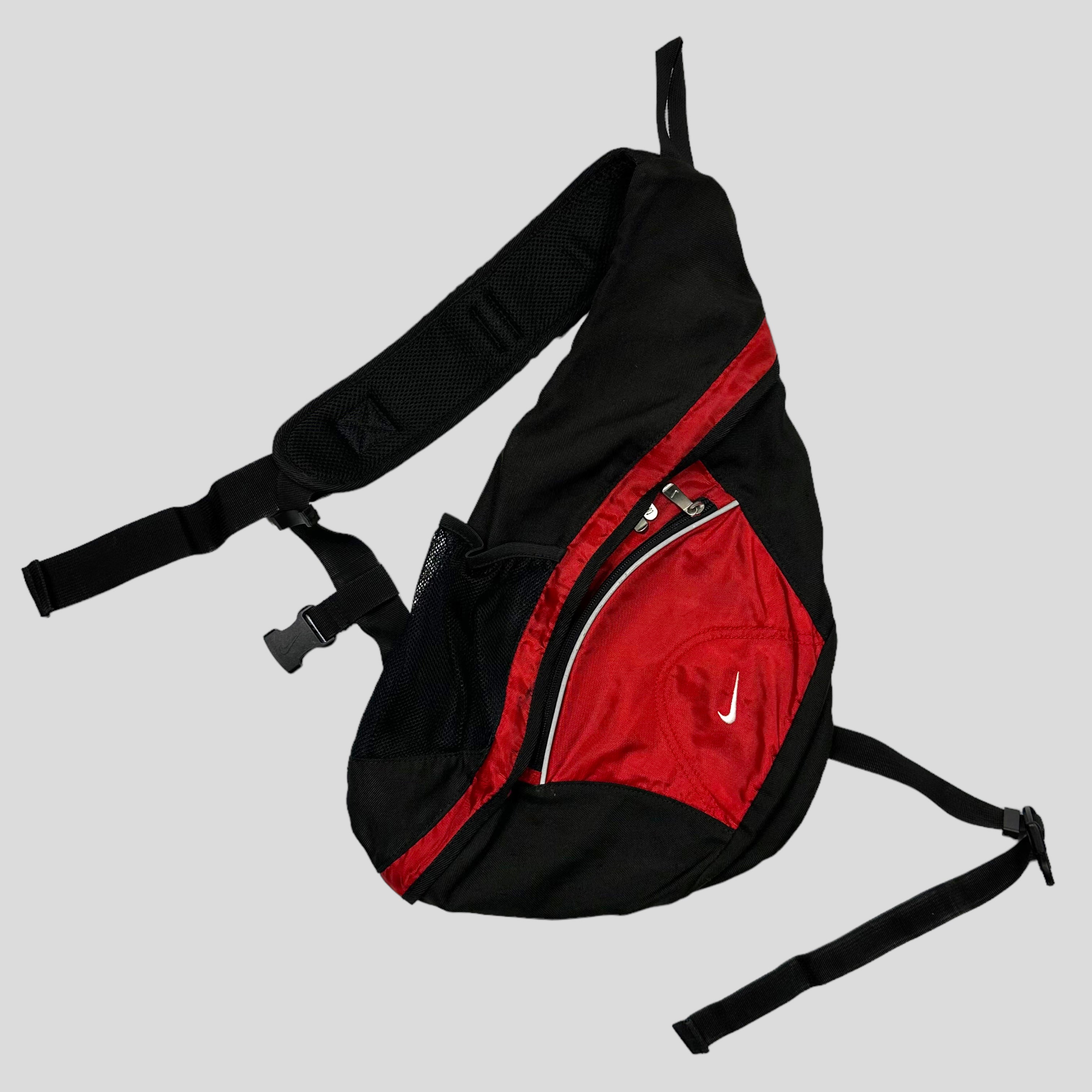 Nike sling hotsell bag red