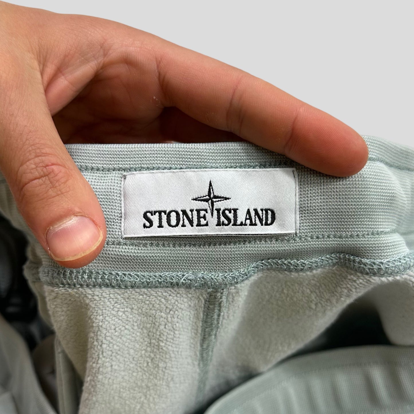 Stone Island AW22 Micrographic Spellout Logo Baby Blue Joggers - XL