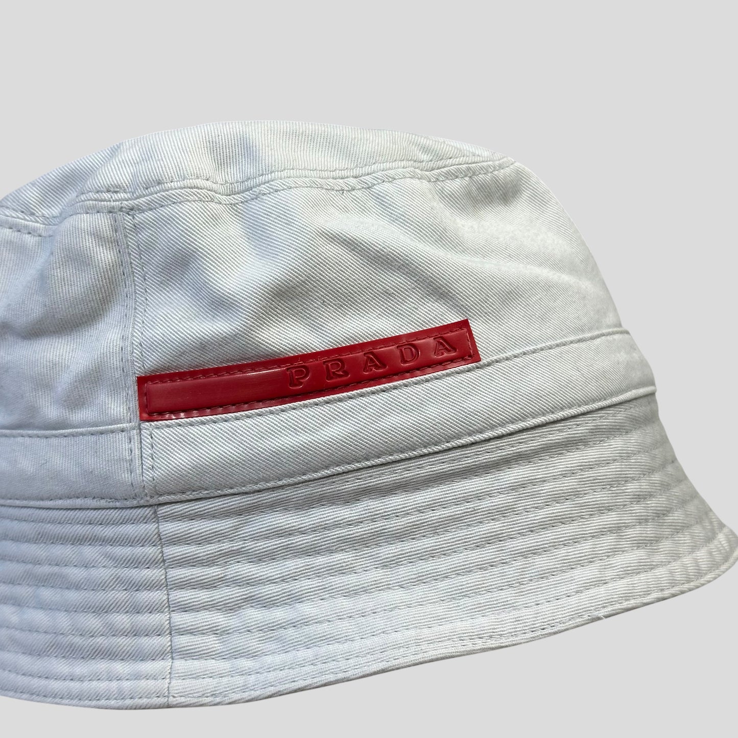 Prada Sport 1999 White Cotton Red Rubber Tab Bucket Hat - M