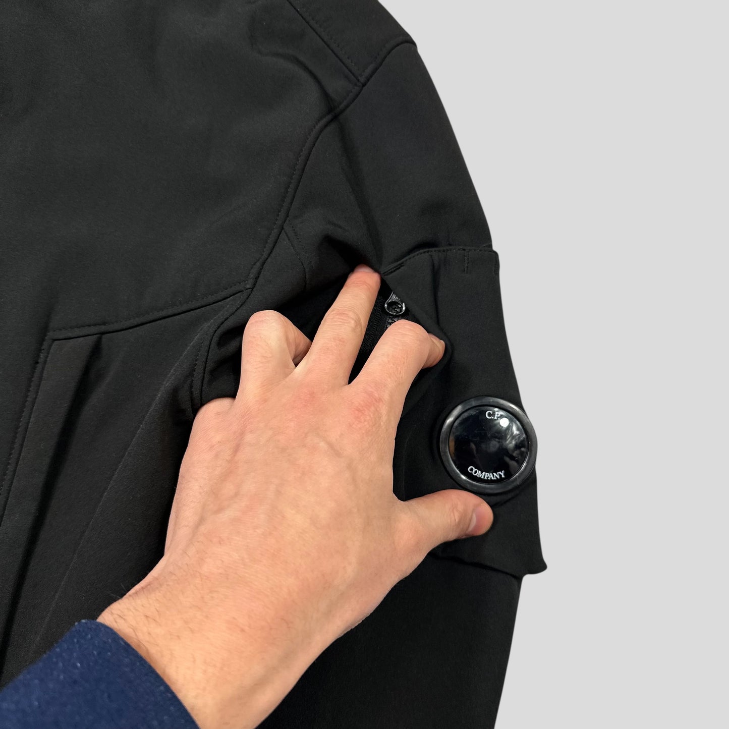 CP Company Black Soft Shell Lens Bomber Jacket - M