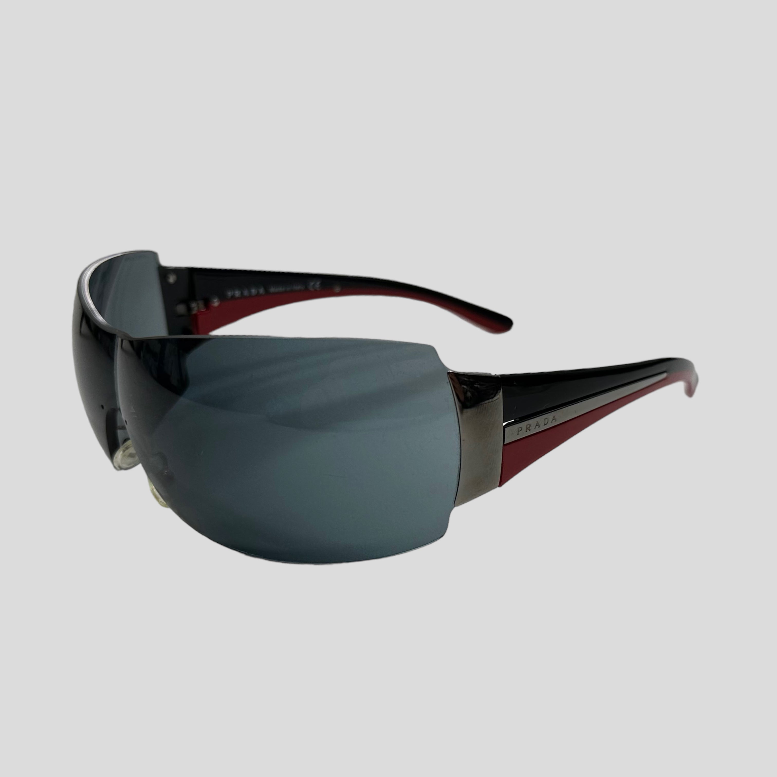 Prada frameless sunglasses best sale