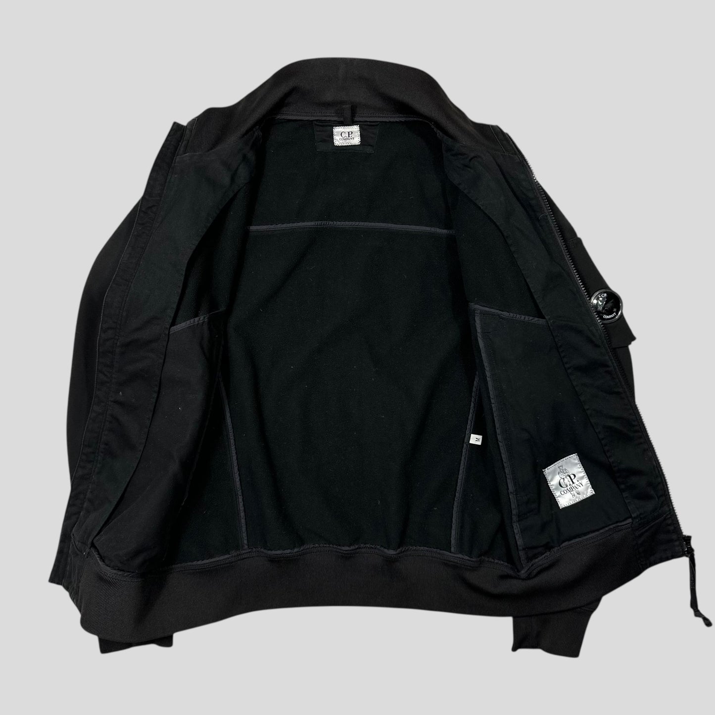 CP Company Black Soft Shell Lens Bomber Jacket - M